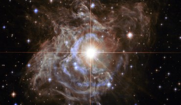This Hubble image shows RS Puppis, one of the most luminous in the class of Cepheid variable stars. Image credit: NASA / ESA / Hubble Heritage Team / STScI / AURA / H. Bond, STScI and Pennsylvania State University.