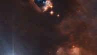 This image from the NASA/ESA Hubble Space Telescope shows the reflection nebula NGC 1333 and associated Herbig-Haro objects. The picture was snapped by Hubble’s Advanced Camera for Surveys (ACS). The image was made through two filters. The color results from assigning different hues to each monochromatic image associated with an individual filter. Image credit: NASA / ESA / Hubble / K. Stapelfeldt.