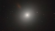This new image from Hubble shows an elliptical galaxy called Messier 105. Image credit: NASA / ESA / Hubble / C. Sarazin et al.