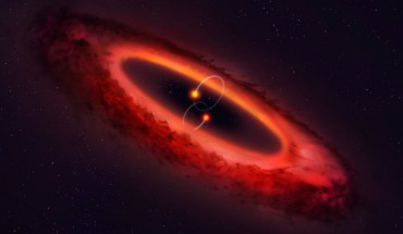 An artist’s impression of a view of the HD 98800BaBb binary star system and the surrounding disk. Image credit: Mark Garlick, University of Warwick.