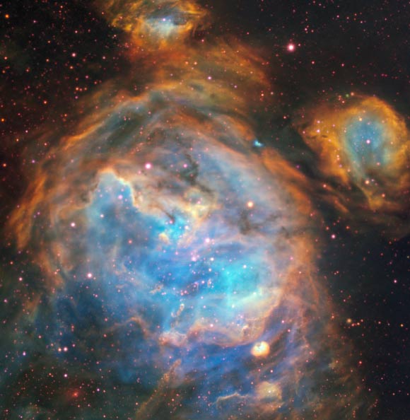 The HII region LHA 120-N 180B resides in the Large Magellanic Cloud, a satellite galaxy of the Milky Way. At only around 160,000 light-years away from the Earth, it is practically on our doorstep. Image credit: ESO / A. McLeod et al.