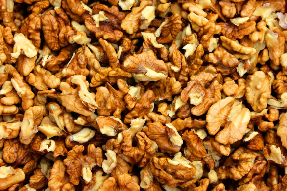 Consuming walnuts may be associated with a lower prevalence and frequency of depression symptoms among American adults. Image credit: Alicja.