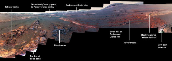 This 360-degree panorama is composed of 354 images taken by Pancam from May 13 through June 10, 2018. This is the last panorama Opportunity acquired before the solar-powered rover succumbed to a global Martian dust storm on the same June 10. The view is presented in false color to make some differences between materials easier to see. To the right of center and near the top of the frame, the rim of Endeavour Crater rises in the distance. Just to the left of that, rover tracks begin their descent from over the horizon towards the location that would become Opportunity’s final resting spot in Perseverance Valley, where the panorama was taken. At the bottom, just left of center, is the rocky outcrop Opportunity was investigating with the instruments on its robotic arm. To the right of center and halfway down the frame is another rocky outcrop -- about 23 feet (7 m ) distant from the camera -- called ‘Ysleta del Sur,’ which Opportunity investigated from March 3 through 29, 2018. In the far right and left of the frame are the bottom of Perseverance Valley and the floor of Endeavour Crater. Located on the inner slope of the western rim of Endeavour Crater, Perseverance Valley is a system of shallow troughs descending eastward about the length of two football fields from the crest of Endeavour’s rim to its floor. This view combines images collected through three Pancam filters. The filters admit light centered on wavelengths of 753 nm (near-infrared), 535 nm (green) and 432 nm (blue). The three-color bands are combined. A few frames (bottom left) remain black and white, as the solar-powered rover did not have the time to photograph those locations using the green and violet filters before a severe Mars-wide dust storm swept in on June 2018. Image credit: NASA / JPL-Caltech / Cornell / ASU.