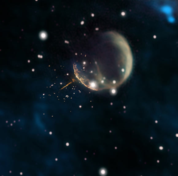 The CTB 1 supernova remnant resembles a ghostly bubble in this image, which combines new 1.5 GHz observations from the Very Large Array (orange, near center) with older observations from the Dominion Radio Astrophysical Observatory’s Canadian Galactic Plane Survey (1.42 GHz, magenta and yellow; 408 GHz, green) along with infrared data (blue). The VLA data clearly reveal the straight, glowing trail from PSR J0002+6216 and the curved rim of the remnant’s shell. Image credit: Jayanne English, University of Manitoba / NRAO / F. Schinzel et al / DRAO / Canadian Galactic Plane Survey / NASA / IRAS.