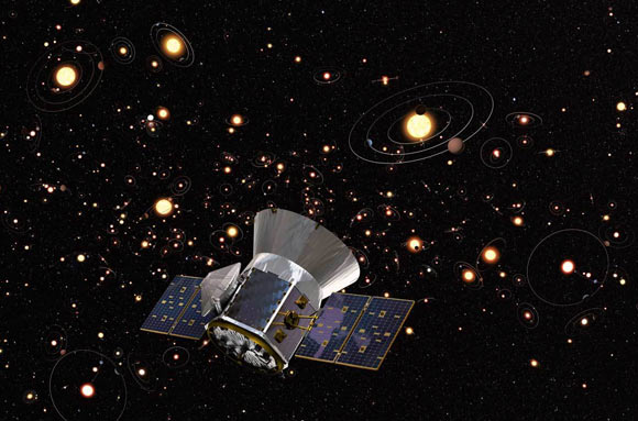 An artists’ concept of NASA’s Transiting Exoplanet Survey Satellite against a background of stars and orbiting planets in the Milky Way. Image credit: ESA / M. Kornmesser, ESO / Aaron E. Lepsch, ADNET Systems Inc / Britt Griswold, Maslow Media Group / NASA’s Goddard Space Flight Center / Cornell University.