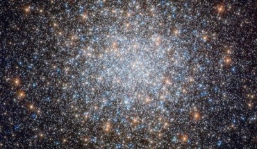 This Hubble image shows the globular cluster Messier 3. The color image was made from separate exposures taken in the visible and ultraviolet regions of the spectrum with Hubble’s Wide Field Camera 3 (WFC3). Five filters were used to sample various wavelengths. The color results from assigning different hues to each monochromatic image associated with an individual filter. Image credit: NASA / ESA / Hubble / G. Piotto et al.