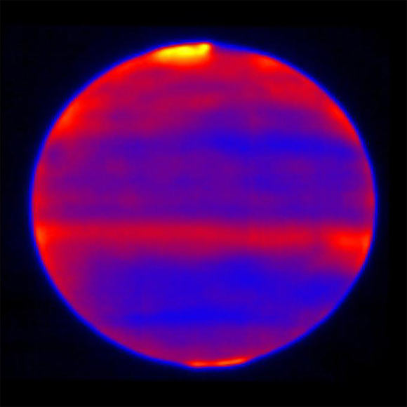 This infrared image was recorded by Subaru Telescope’s COMICS instrument. Sinclair et al used red, blue and yellow to infuse this image; regions of the atmosphere that are more yellow and red indicate the hotter areas. This highlights the auroral heating that occurs at Jupiter’s poles, where energy from the solar wind and magnetosphere are deposited. This image was captured on January 12, 2017. Image credit: NAOJ / NASA / JPL-Caltech.
