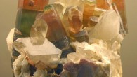 This image shows tri-color crystals of elbaite, a mineral species belonging to the tourmaline group, on quartz. Image credit: Reno Chris.