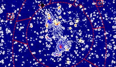 LOFAR image centered on the Abell 0399-Abell 0401 system; color and contours show the radio emission at 140 MHz; the faceting of the field is shown with red lines. Image credit: Govoni et al, doi: 10.1126/science.aat7500.