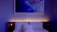 Sleeping with a TV or artificial light on may be a risk factor for gaining weight or developing obesity. Image credit: Pexels.