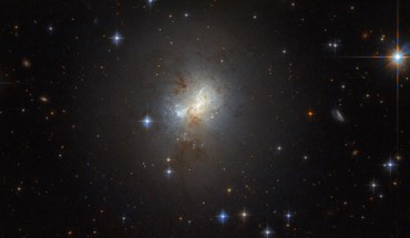 This Hubble image shows the dwarf starburst galaxy ESO 495-21. The galaxy is just 3,000 light-years across, a fraction of the size of the Milky Way, but that is not stopping the galaxy from furiously forming huge numbers of stars. This image is a composite of separate exposures acquired by Hubble’s Wide Field Planetary Camera 2 (WFPC2) and Advanced Camera for Surveys (ACS) instruments. Image credit: NASA / ESA / Hubble.