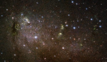 This Hubble image shows the irregular galaxy IC 10. The image is made up of observations from Hubble’s Advanced Camera for Surveys (ACS) in the optical part of the spectrum. It is based on data obtained through three filters. The color results from assigning different hues to each monochromatic image associated with an individual filter. Image credit: NASA / ESA / Hubble / F. Bauer.