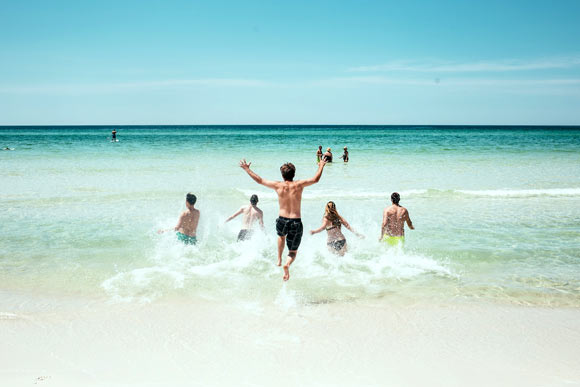 Swimming in the ocean alters the skin microbiome and may increase the likelihood of infection. Image credit: Pexels.