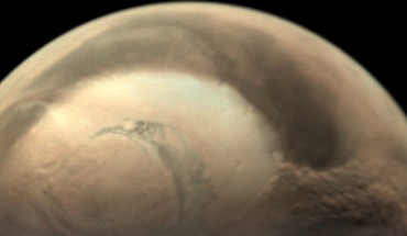 A dust storm underway at the edge of the north polar ice cap of Mars. The image was taken by Mars Express’ Visual Monitoring Camera on May 29, 2019. Image credit: ESA / GCP / UPV / EHU Bilbao.