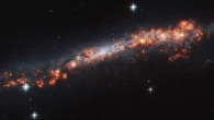 This Hubble image shows the edge-on distorted spiral galaxy NGC 3432. The color image was made from separate exposures taken in the visible region of the spectrum with Hubble’s Advanced Camera for Surveys (ACS). Two filters were used to sample various wavelengths. The color results from assigning different hues to each monochromatic image associated with an individual filter. Image credit: NASA / ESA / Hubble / A. Filippenko / R. Jansen.