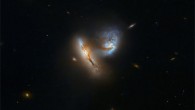 Two interacting galaxies UGC 2369N and UGC 2369S were imaged using Hubble’s Advanced Camera for Surveys (ACS). Two filters were used to sample various wavelengths. The color results from assigning different hues to each monochromatic image associated with an individual filter. Image credit: NASA / ESA / Hubble / A. Evans.