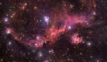 Colorful and wispy Sharpless 2-296 forms the ‘wings ‘ of an area of sky known as the Seagull Nebula -- named for its resemblance to a gull in flight. This celestial bird contains a fascinating mix of intriguing astronomical objects. Glowing clouds weave amid dark dust lanes and bright stars. The Seagull Nebula -- made up of dust, hydrogen, helium and traces of heavier elements -- is the hot and energetic birthplace of new stars. Image credit: ESO / VPHAS+ Team / N.J. Wright, Keele University.
