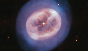 This image, taken with Hubble’s Advanced Camera for Surveys (ACS), shows the planetary nebula NGC 2022. The color composite was assembled from images taken in visible and infrared light. Two filters were used to sample various wavelengths. The color results from assigning different hues to each monochromatic image associated with an individual filter. Image credit: NASA / ESA / Hubble / R. Wade.