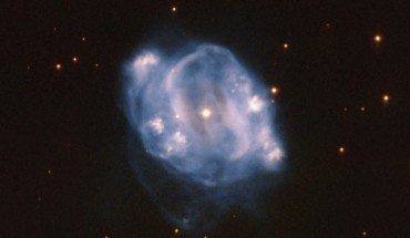 This Hubble image shows the planetary nebula NGC 5307. The color image was made from separate exposures taken in the visible and near-infrared regions of the spectrum with Hubble’s Advanced Camera for Surveys (ACS). It is based on data obtained through two filters. The color results from assigning different hues to each monochromatic image associated with an individual filter. Image credit: NASA / ESA / Hubble / R. Wade et al.