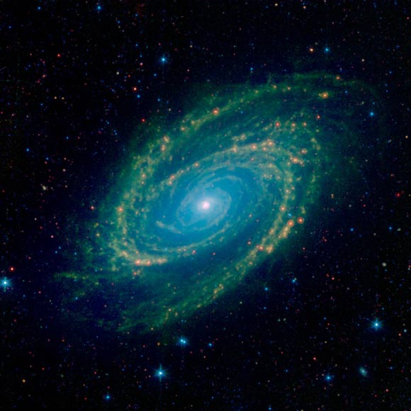 This infrared image taken by NASA’s Spitzer Space Telescope shows a spiral galaxy called Messier 81. Image credit: NASA / JPL-Caltech.