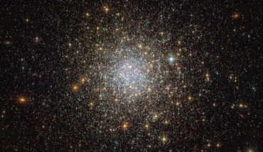 This Hubble image reveals an ancient, glimmering ball of stars called NGC 1466. It is a globular cluster that is slowly moving through space on the outskirts of the Large Magellanic Cloud. NGC 1466 has a mass equivalent to roughly 140,000 Suns and an age of around 13.1 billion years, making it almost as old as the Universe itself. Image credit: NASA / ESA / Hubble.