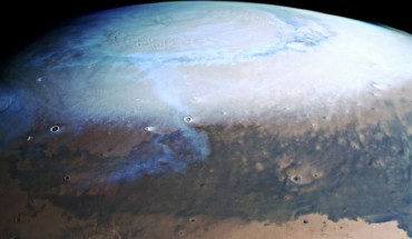 This image from ESA’s Mars Express shows a beautiful slice of the Red Planet from the northern polar cap downwards, and highlights cratered, pockmarked swathes of the Terra Sabaea and Arabia Terra regions. It comprises data gathered on June 17, 2019. This image was created using data from the nadir and color channels of Mars Express’ High Resolution Stereo Camera. The nadir channel is aligned perpendicular to the surface of Mars, as if looking straight down at the surface. North is up. Image credit: ESA / DLR / FU Berlin.