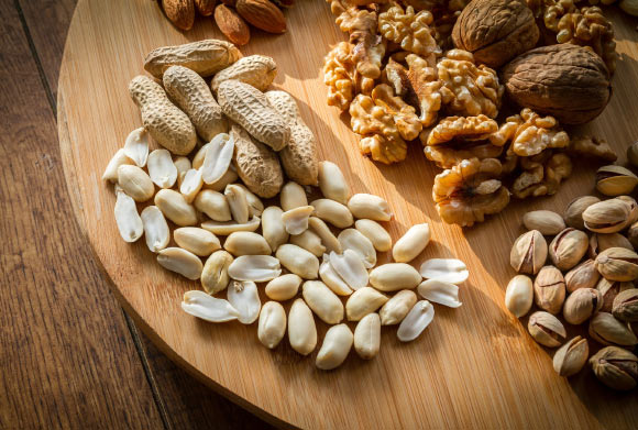 Increasing daily consumption of nuts is associated with less long-term weight gain and a lower risk of obesity in adults. Image credit: Piviso.