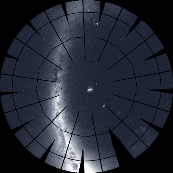 This mosaic of the southern sky was assembled from 208 TESS images. Among the many notable celestial objects visible is the glowing band (left) of the Milky Way, our home Galaxy seen edgewise, the Orion Nebula (top), a nursery for newborn stars, and the Large Magellanic Cloud (center), a nearby galaxy located about 163,000 light-years away. The prominent dark lines are gaps between the detectors in TESS’ camera system. Image credit: NASA / MIT / TESS / Ethan Kruse, USRA.