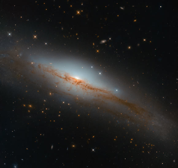 This new image from the NASA/ESA Hubble Space Telescope shows the spiral galaxy NGC 3749. The image is made up of observations from Hubble’s Wide Field Camera 3 (WFC3) in the infrared and optical parts of the spectrum. Two filters were used to sample various wavelengths. The color results from assigning different hues to each monochromatic image associated with an individual filter. Image credit: NASA / ESA / Hubble / D. Rosario et al.