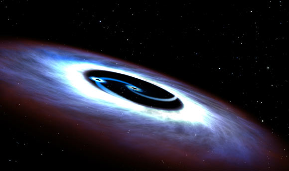 An artistic illustration of a binary black hole. Image credit: NASA / ESA / G. Bacon, STScI.