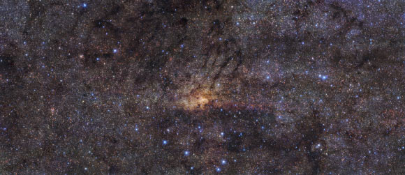 Taken with the HAWK-I instrument on ESO’s Very Large Telescope, this stunning image shows the Milky Way’s central region with an angular resolution of 0.2 arcseconds. The image combines observations in three different wavelength bands. Image credit: ESO / Nogueras-Lara et al.