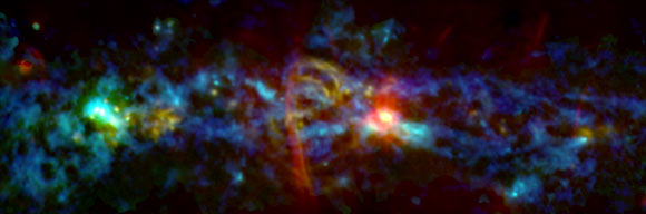 This composite image, which combines infrared (blue), radio (red) and microwave (green) observations  from the GISMO instrument, reveals emission from cold dust, areas of vigorous star formation, and filaments formed at the edges of a bubble blown by some powerful event at the Milky Way Galaxy’s center. Image credit: NASA’s Goddard Space Flight Center.