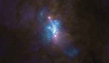 NGC 6240 as seen with ALMA. Image credit: ALMA / ESO / NAOJ / NRAO / E. Treister / AUI / NSF / S. Dagnello / NASA / ESA / Hubble.