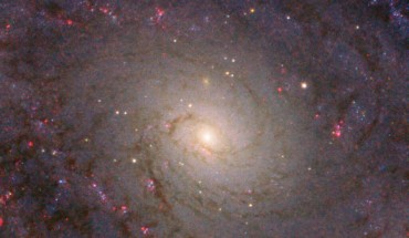 This Hubble image reveals a detailed view of the central part of the grand design spiral galaxy NGC 5364. The color image was made from separate exposures taken in the visible and infrared regions of the spectrum with Hubble’s Advanced Camera for Surveys (ACS) and Wide Field Camera 3 (WFC3). Four filters were used to sample various wavelengths. The color results from assigning different hues to each monochromatic image associated with an individual filter. Image credit: NASA / ESA / Hubble / L. Ho.