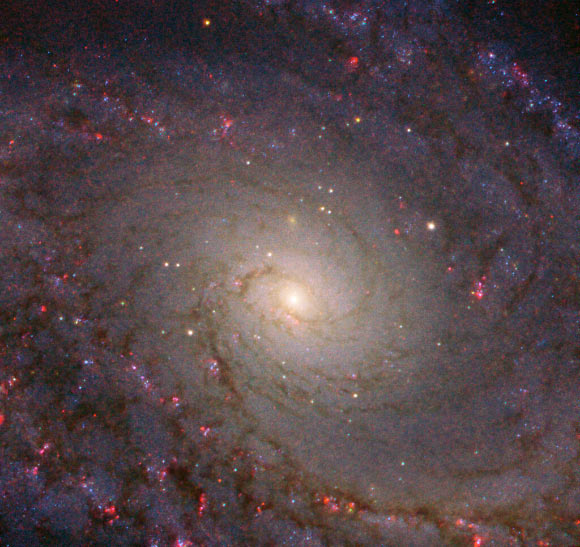 This Hubble image reveals a detailed view of the central part of the grand design spiral galaxy NGC 5364. The color image was made from separate exposures taken in the visible and infrared regions of the spectrum with Hubble’s Advanced Camera for Surveys (ACS) and Wide Field Camera 3 (WFC3). Four filters were used to sample various wavelengths. The color results from assigning different hues to each monochromatic image associated with an individual filter. Image credit: NASA / ESA / Hubble / L. Ho.