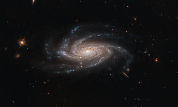 This Hubble image shows NGC 2008, a spiral galaxy located 426 million light-years away in the constellation Pictor. Image credit: NASA / ESA / Hubble / A. Bellini.