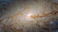 This Hubble image shows the central part of the barred spiral galaxy NGC 3887. The image is made up of observations from Hubble’s Wide Field Camera 3 (WFC3) in the infrared and optical parts of the spectrum. It is based on data obtained through three filters. The color results from assigning different hues to each monochromatic image associated with an individual filter. Image credit: NASA / ESA / Hubble / P. Erwin et al.