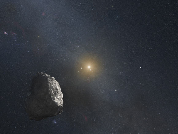 An artist’s impression of a trans-Neptunian object. Image credit: NASA / ESA / G. Bacon, STScI.