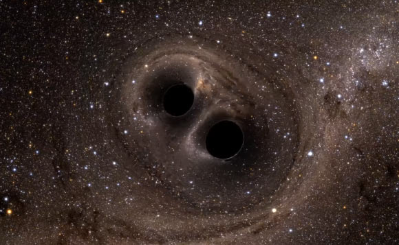 The collision of two black holes. Image credit: Simulating eXtreme Spacetimes Project.