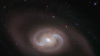This Hubble image shows the spiral galaxy NGC 2273. The color image was made from separate exposures taken in the visible and infrared regions of the spectrum with Hubble’s Wide Field Camera 3 (WFC3). It is based on data obtained through five filters. The color results from assigning different hues to each monochromatic image associated with an individual filter. Image credit: NASA / ESA / Hubble / J. Greene.