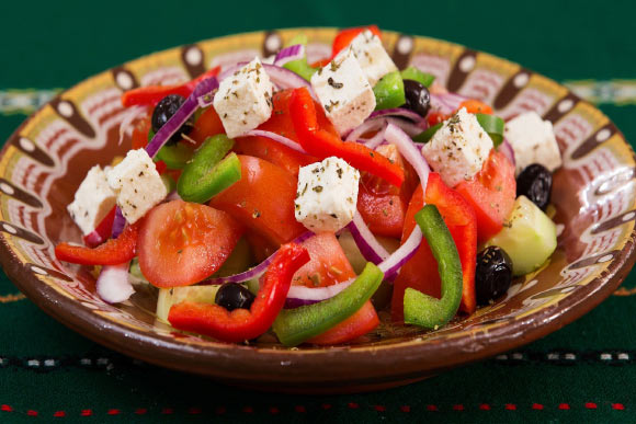 The Mediterranean diet emphasizes consumption of whole fruits, vegetables, whole grains, nuts, legumes, fish, and olive oil, as well as reduced consumption of red meat and alcohol. Image credit: Julia Pastel100.