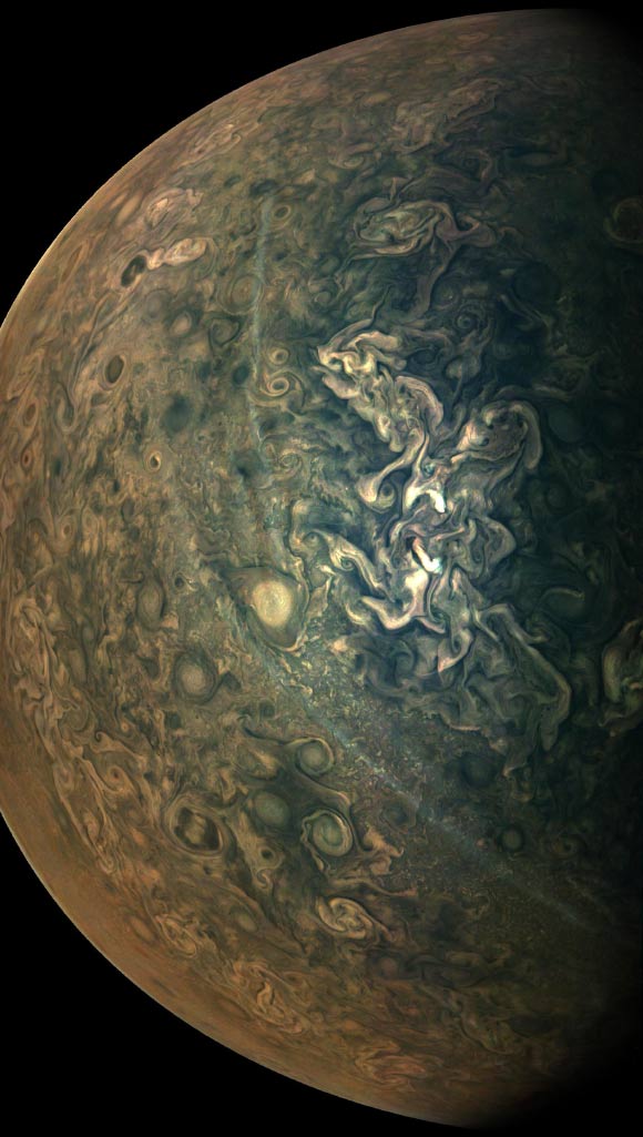 This image of Jupiter was taken on February 17, 2020 as Juno performed its 25th close flyby of the gas giant. At the time the image was taken, the spacecraft was 25,120 km (15,610 miles) from the planet’s cloud tops at a latitude of about 71 degrees North. Image credit: NASA / JPL / SwRI / MSSS / Gerald Eichstaedt.