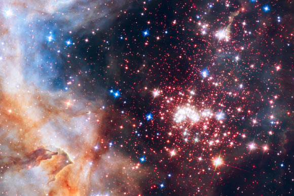 This Hubble image shows the star cluster Westerlund 2. Image credit: NASA / ESA / Hubble Heritage Team / STScI / AURA / A. Nota / Westerlund 2 Science Team.