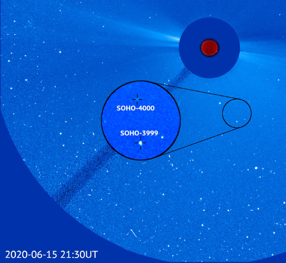 SOHO-4000 is seen here in an image from the SOHO alongside its 3,999th comet discovery. The two comets are relatively close at approximately 1 million miles apart, suggesting that they could have been connected together as recently as a few years ago. Image credit: ESA / NASA / SOHO / Karl Battams.
