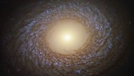 This Hubble image shows a flocculent spiral galaxy called NGC 2775. The image was made from separate exposures taken in the visible, ultraviolet and near-infrared regions of the spectrum with Hubble’s Wide Field Camera 3 (WFC3). It is based on data obtained through five filters. The color results from assigning different hues to each monochromatic image associated with an individual filter. Image credit: NASA / ESA / Hubble / J. Lee / PHANGS-HST Team / Judy Schmidt, www.geckzilla.com.