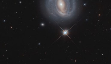 This Hubble image shows NGC 4907, a barred spiral galaxy located 284 million light-years away in the constellation of Coma Berenices. The image is a composite of separate exposures acquired by Hubble’s Wide Field Camera 3 (WFC3). Two filters were used to sample various wavelengths. The color results from assigning different hues to each monochromatic image associated with an individual filter. Image credit: NASA / ESA / Hubble / M. Gregg.
