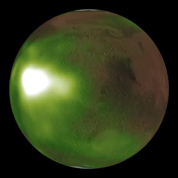 This image shows the ultraviolet nightglow in the Martian atmosphere. Green and white false colors represent the intensity of ultraviolet light, with white being the brightest. The nightglow was measured at about 70 km altitude by the Imaging UltraViolet Spectrograph instrument on NASA’s MAVEN spacecraft. A simulated view of the Mars globe is added digitally for context. The image shows an intense brightening in Mars’ nightside atmosphere. The brightenings occur regularly after sunset on Martian evenings during fall and winter seasons, and fade by midnight. The brightening is caused by increased downwards winds which enhance the chemical reaction creating nitric oxide which causes the glow. Image credit: NASA / MAVEN / NASA’s Goddard Space Flight Center / CU / LASP.