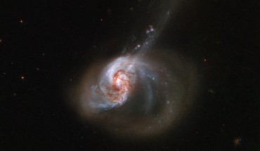 This Hubble image shows the barred spiral galaxy NGC 1614. The color image is made up of observations from Hubble’s Wide Field Camera 3 (WFC3) and Advanced Camera for Surveys (ACS) in the near-infrared and optical parts of the spectrum. Four filters were used to sample various wavelengths. The color results from assigning different hues to each monochromatic image associated with an individual filter. Image credit: NASA / ESA / Hubble / A. Adamo.