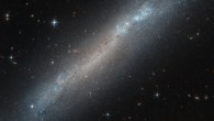 This Hubble image shows NGC 2188, a barred spiral galaxy located 27 million light-years away in the constellation of Columba. Image credit: NASA / ESA / Hubble / R. Tully.