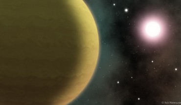 An artist’s impression of the warm-Jupiter exoplanet TOI-1899b and the red dwarf TOI-1899, the lowest-mass star known to host a transiting warm Jupiter. Image credit: Sci-News.com.